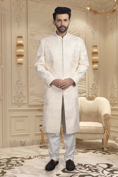 Introducing our Mens Sherwani R14-S57, the epitome of elegance. Adorned with delicate thread embroidery, this sherwani is perfect for a groom looking for a sophisticated and luxurious outfit. Elevate your wedding day with this exquisite thread work sherwani. Mens Sherwani, Groom Looks, Thread Embroidery, Thread Work, Luxury Outfits, Wedding Day, Thread, Embroidery