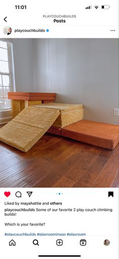 an empty room with two wooden benches on the floor and one bench that is upside down