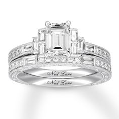 a diamond engagement ring with an engraved message on the side