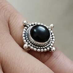 Product Details: Handcrafted with high-quality 925 Sterling Silver Features a natural Black Onyx 10.0 mm round gemstone Boho-chic design with a vintage appeal Perfect as a July birthstone ring Lightweight and comfortable for daily wear Ideal gift for her on birthdays, anniversaries, or special occasions Elegant, mystical, and timeless design Description: The Celestial Serenity Black Onyx 925 Sterling Silver Ring is a symbol of elegance, strength, and mysticism. Inspired by ancient bohemian tradi Black Round Rings With Bezel Setting, Black Round Ring With Bezel Setting, Black Spiritual Round Rings, Onyx Cabochon Rings, Onyx Cabochon Round Rings, Round Onyx Cabochon Rings, Black Rings With Round Gemstone, July Birthstone Ring, July Born