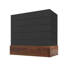 an image of a black and wood block