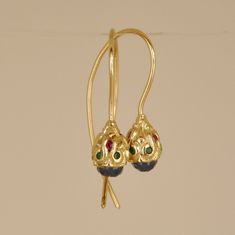 "These blue sapphire earrings are 14k solid gold earrings. Small dainty dangle earrings with my favorite gemstones: Emerald, Sapphire, and Ruby, make these earrings a fine, delicate, unique piece of jewelry. The earrings are all handmade, hand-engraved meticulously in cold wax to include all tiny dainty details, the wax model is then casted in Gold with nine small color stones set between the elements and a larger Sapphire set at the bottom. The peer is 14 k solid gold. For a perfect 360 look, e Yellow Gold Sapphire Drop Earrings, Yellow Gold Sapphire Earrings For Pierced Ears, Yellow Gold Sapphire Earrings Hallmarked, Hallmarked Sapphire Earrings In Yellow Gold, Hallmarked Yellow Gold Sapphire Earrings, Tiny Gold Earrings, Sapphire Earring, Dainty Gold Earrings, Beautiful Gemstones