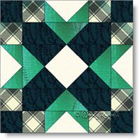 a green and white patchwork quilt design