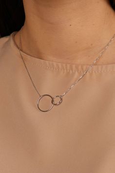 Dimensions Larger circle diameter - 17mm Smaller circle diameter - 13mm Necklace Length: 40 + 5cm (15.7 + 1.9inch) 45 + 5cm (17.7 + 1.9inch) 50 + 5cm (19.6 + 1.9inch) Silver necklace with intertwined circles. The elegant chain style will perfectly accentuate your neck and collarbone. With a simple yet luxurious design, this pendant can easily complement any look, giving it completeness and accent. Materials and designs give a special shine to this piece that will beautify you. As a present Jewel Nickel-free Chain Necklace With Round Pendant, Nickel-free Round Chain Necklace, Adjustable Chain Necklace With Open Circle, Nickel Free Adjustable Round Chain Necklace, Adjustable Nickel Free Round Chain Necklace, Adjustable Nickel-free Chain Necklace, Elegant Nickel-free Round Charm Necklace, Elegant Round Nickel-free Charm Necklace, White Gold Charm Necklace With Adjustable Chain