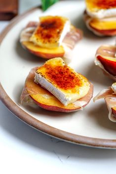 small appetizers are arranged on a plate ready to be eaten