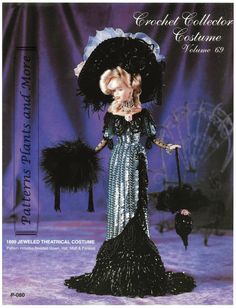 a doll is dressed in black and white with feathers on it's head, holding an umbrella