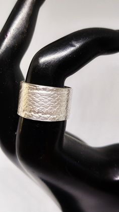 Hand-crafted texture Sterling silver band. Approximately 1/2" inches, Size 7 1/2 Elegant Thick Silver Band, Elegant Silver Thick Band, Modern Wide Band As Gift, Modern Wide Band Rings For Gifts, Modern Wide Band Gift, Modern Wide Band Gift Bands, Classic Silver Wide Band, Classic Wide Band Silver Bands, Classic Silver Band Jewelry