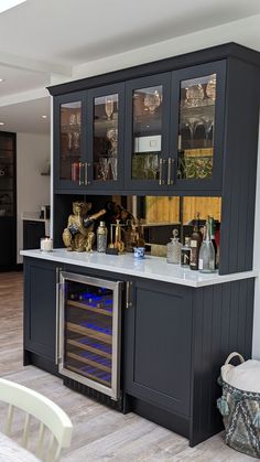 a kitchen with an oven built into the wall