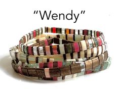 "\"Wendy\" - A mix of matte bronze, iridescent cream, sea foam green, and rustic red Tila beads. Combination of 5x5, 1/2, and 1/4 size beads. Perfect gifts for women and teens. Each bracelet is $13, save $3 and get FREE SHIPPING on orders of a set of three bracelets!" Tilla Bead Bracelet, How To Make A Tila Bead Bracelet, Making Tila Bead Bracelets, Czechmates Tile Bracelet, Metal Tila Bracelet, Boho Bracelets Stack, Wrist Candy, Stretchy Bracelets, Boho Bracelets