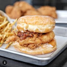 fried chicken sandwich and french fries on a tray