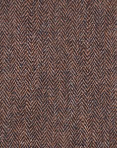 a brown and black checkered tweed fabric textured with dark blue, red, and white colors