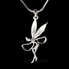 PERFECT CHRISTMAS GIFT FOR LADIES!!!You are getting a Fairy Angel Pendant with Swarovski crystals. It comes with a FREE 18" inches Original Rhodium Plated snake chain necklace with lobster clasp. Pendant size is  3/4" (2.0cm) X 1 5/8" (4.2cm)Crystal Color: Crystal Clear===================Prices are in US$.For shipping policies and other important information, click on “profile” on the right.See an item that you like but has already been sold? Contact me to see if I have more!Thank you for stoppi Silver Necklaces For Valentine's Day Celebration, Silver Christmas Party Necklace, Silver Necklace For Christmas Party, Silver Necklace For Birthday And Christmas, Dancer Necklace, Paw Print Charm, Angel Wing Pendant, Angel Pendant, Tinker Bell