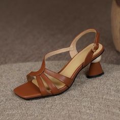 Handmade with premium leather. these open toe sandals are stylish and unique. Upper: Genuine Leather Lining: Genuine Leather Outsole: TPR Toe Shape: Open Toe Heel: 6.5cm/2.5'' Closure: Buckle Strap is_handmade: Yes Spring Open Toe T-strap Sandals With Padded Heel, Elegant Brown Closed Toe T-strap Sandals, Leather Slingback Sandals With Padded Heel For Summer, Brown Open Toe Heels For Summer, Brown Open Toe T-strap Sandals For Spring, Leather T-strap Sandals With Padded Heel For Summer, Brown Open Toe Wedge Sandals, Chic T-strap Sandals With Padded Heel And Open Toe, Elegant Open Toe T-strap Sandals For Spring