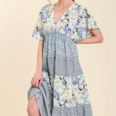 V-Neck Mixed Floral Print Tiered Midi Dress With Flutter Sleeves, Ruffle Trim Along Tiers, Cinched Waist With Elastic No Lining Nwt Blue V-neck Midi Dress With Ditsy Floral Print, Lavender V-neck Maxi Dress For Spring, Blue Floral Print V-neck Midi Dress, Blue Floral Print Midi-length V-neck Dress, Blue V-neck Maxi Dress For Spring, Blue V-neck Dress With Ditsy Floral Print, Flowy Lavender V-neck Maxi Dress, Spring Light Blue V-neck Maxi Dress, Blue Midi-length V-neck Dress For Spring