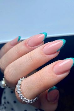 These almond-shaped nails offer a classy look with a naturally nude base. The tips are dipped in a brilliant turquoise glitter, giving a bold contrast and a touch of sparkle that's perfect for any glamorous occasion. The unified design across each nail creates a harmonious and sophisticated vibe. Simply gorgeous!✨  // Photo Credit: Instagram @jazzynailsx June Almond Nails Ideas, French Tips Nail Ideas, Turquoise French Tip Nails, Turquoise Nail Ideas, Tips Nail Ideas, Cool Henna Tattoos, Pink Oval Nails, Cool Henna, Shein Finds