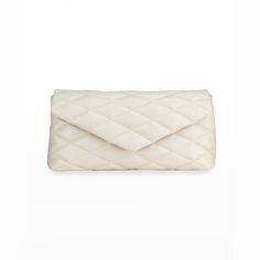 Saint Laurent "Sade" puffy clutch bag in quilted lamb leather. Envelope flap top with snap closure. Exterior, back YSL logo hardware. Interior, one zip pocket. Ysl Clutch, Leather Envelope Clutch, Envelope Clutch Bag, Saint Laurent Handbags, Leather Envelope, Handbag Stores, Large Clutch, Ysl Logo, Canvas Clutch