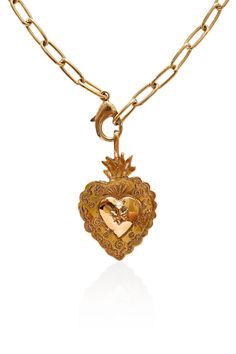 Discover the transformative power of love with our Divine Dove Sacred Heart Necklace. This exquisite piece entails a large, statement pendant showcasing a sacred heart motif. Within the heart's embrace, a delicate dove takes flight, symbolizing peace, hope, and the divine spirit. The fire that encircles the heart represents the transformative power of love, reminding us of its ability to purify and illuminate.This design features a large Bronze sacred heart pendant adorned with a dove, hung from a chunky Triple 18K Electroplated Gold over Brass paperclip chain. Customize to the desired length with the adjustable close.Details: • 5cm Pendant• 16" Chain• 12" Hanging Length• Hook Close Sacred Heart Of Jesus Necklace, Sacred Heart Necklace, Divine Spirit, Jesus Necklace, Heart Motif, Power Of Love, Heart Of Jesus, Statement Pendant, Sacred Heart