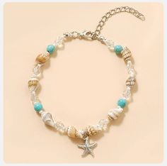 Product Overview Embrace the spirit of summer and enhance your beach attire with our Charming Starfish and Green Stone Beaded Anklet. Perfect for women who love to express their style effortlessly, this anklet combines elegance and playful charm in one beautiful accessory. Whether you're lounging by the sea or dancing at a beach party, this anklet adds a touch of glamour to any outfit. Key Features Material: High-quality zinc alloy that's both durable and lightweight. Design: Adorned with a capt Anklet For Women, Beaded Anklet, Beach Attire, Seashell Jewelry, Beaded Anklets, Beach Holiday, Green Crystals, Green Stone, Jewelry Diy