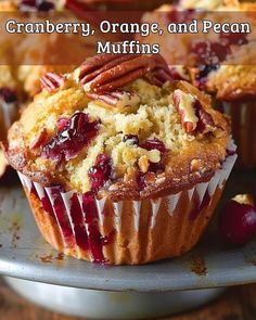 cranberry orange and pecan muffins on a plate