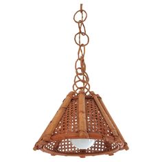 a hanging light made out of wood and wicker