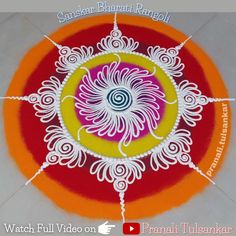 an artistic rangolite design on the floor for diwali or pongali