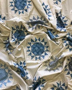 the blue and white quilt is made up