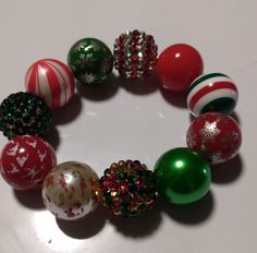 Elastic bracelet with a variety christmas themed beads . Chunky Beads, Elastic Bracelet, Bead Bracelet, Christmas Themes, Jewelry Bracelets, Beaded Bracelets, Elastic, Bracelet, Beads