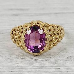 "L-1941  Vintage Purple Sapphire 18K Yellow Gold Ring 6 Retro 1960's Luxury Design Pretty  AMAZING VINTAGE 1960's SOLID 18K GOLD RING. SET WITH A PURPLE SAPPHIRE. WEAR ALONE ON WITH YOUR STACK. THE SHANK HAS SOME ROUGHNESS ON ONE SIDE. WONDERFUL COLOR & HIGHEST QUALITY. JUST PART OF MY MOST RECENT ESTATE FINDS! FOLLOW ME TO SEE THEM ALL!    Metal: 18K Yellow Gold Metal Purity: 18K Material: Sapphire Ring Size: 6 Other Dimensions: 1/2\"w Form: Ring Luxury Age: Vintage Weight (Grams): 5.3 IT IS IN EXCELLENT ESTATE CONDITION  ALL ITEMS LISTED AS GOLD ARE EITHER MARKED AND OR TESTED FOR CONTENT  TO HELP DETERMINE SIZE / SCALE OF PIECE THE QUARTER IS PICTURED AND MEASURES 24.16mm OR .95 INCHES    PLEASE DON'T BE AFRAID TO SEND AN OFFER, I AM NEVER OFFENDED & I LOVE GIVING DEALS!  The pictures a Vintage Yellow Gold Hallmarked Amethyst Ring, Victorian Amethyst Ring With Center Stone In Gold, Victorian Gold Amethyst Ring With Center Stone, Vintage Yellow Gold Signet Ring With Center Stone, Gold Amethyst Ring Collectible Fine Jewelry, Gold Amethyst Ring Fine Jewelry Collectible, Gold Amethyst Ring, Fine Jewelry Collectible, Gold Amethyst Ring In Fine Jewelry Style, Antique Gold Amethyst Ring With Center Stone