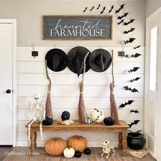 the entryway is decorated for halloween with black and white decorations