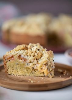 a piece of cake sitting on top of a wooden plate