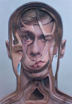 a man's face is made up of cut outs