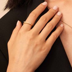 Minimalism meets glamour in our Brooklyn Bar Ring. A single gold bar sits perched atop a classic gold band to add shine and bold shape to your everyday stack. The Finer Points: Metal: 14 Karat Gold Dimensions: 2mm Width Weight: 1.2 Grams Origin: Crafted in Arezzo, Italy Minimalist Single Diamond Open Band Jewelry, Sleek Everyday Round Band Jewelry, Sleek Round Band Jewelry As Gift, Sleek Round Band Jewelry For Everyday, Minimalist Single Diamond Stackable Rings For Formal Occasions, Minimalist Stackable Rings With Single Diamond For Formal Occasions, Minimalist Formal Signet Ring With Single Diamond, Minimalist Yellow Gold Stackable Rings With Open Band, Sleek Everyday Yellow Gold Jewelry