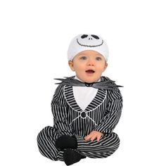 a baby dressed in a jack skelling costume sitting on the floor with his legs crossed