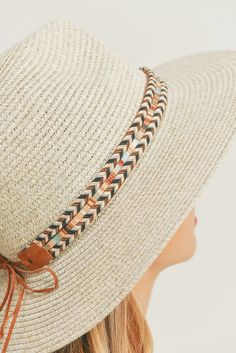 Add a touch of boho charm to your look with this stylish Straw Panama Fedora Hat! Quality crafted and accented with a Boho embroidered band, this hat is the perfect way to stay looking cool and on-trend. Plus, the suede tie accent gives it a unique touch! Material: 100% paper straw Circumference: 22" Brim length: 3.25" Cream Hat Bands For Summer Vacation, Trendy Woven Beige Straw Hat, White Summer Hat Band For Travel, Bohemian Cream Wide Brim Sun Hat, White Woven Hat Bands For Summer, Cream Bohemian Wide Brim Sun Hat, Summer Cream Hat Band For Vacation, Casual Braided Hat Bands For Beach, Casual Braided Hat Bands For Vacation