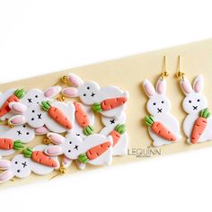 the decorated cookies are shaped like bunnies and carrots