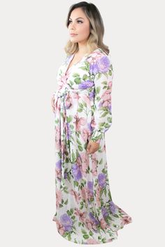 This is the perfect floral sweetheart pregnancy maxi. Features a gorgeous combination of pink, purple, and ivory with a standout large floral print. The sweetheart neckline is perfect for nursing, long chiffon sleeves, and a tie waistline to keep you comfy! An ideal floral baby shower maxi, date night dress, or just because. Designed for wear throughout all nine months of pregnancy and beyond! Pink Long Sleeve Maternity Maxi Dress, Long Sleeve Pink Maxi Dress For Maternity, Flowy Long Sleeve Maternity Maxi Dress, Flowy Long Sleeve Maxi Dress For Maternity, Feminine Purple Long Sleeve Maxi Dress, Pink Maxi Maternity Dress For Spring, Spring Floral Print Maternity Maxi Dress, Spring Maternity Maxi Dress With Floral Print, Spring Maternity Wear Floral Print Maxi Dress