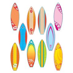 a group of surfboards sitting next to each other on top of a white surface