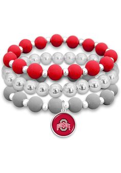 Accessorize your Buckeyes game day style with this Ohio State Buckeyes Amanda Stacked Womens Bracelet. This Womens Bracelet features a three team color bracelets with team logo charm. Red Team Spirit Bracelets For Sports Events, Ohio State Clay Bead Bracelet, Buckeye Necklace Diy, Sporty Red Jewelry For Game Day, Crafts With Buckeyes Ohio, Ohio State Bracelet, Ohio State Buckeyes Bracelet, Ohio State Buckeyes Crafts, Buckeye Jewelry