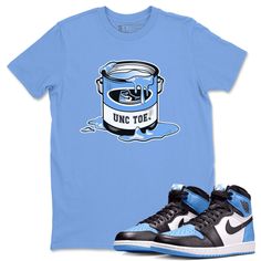 Free domestic shipping on all orders over $60! You'll find the perfect tee to match your Jordan 1 University Blue sneakers.Bucket t-shirt design was made to superbly match your kicks. Shop our Drip Gear Zone collection now to find the best sneaker shirts and Jordan outfits. We have a lot of high-quality sneaker match shirts and more. 100% Cotton [Black,White] 90% Cotton / 10% Polyester [Heather Grey] 50% Cotton / 50% Polyester [Safety Green] Hoodie/Sweatshirt - 80% Cotton / 20% Polyester Light Blue Graphic Print Shirt For Streetwear, Blue Sporty Shirt For Streetwear, Blue Sporty Streetwear Shirt, Sporty Blue Shirt For Streetwear, Light Blue Letter Print Shirt For Streetwear, Light Blue Streetwear Shirt With Letter Print, Blue Fitted Tops For College, Blue Summer Shirt For College, Sporty Blue Shirt With Screen Print