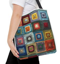 a woman carrying a multicolored crocheted bag with an interesting design on it