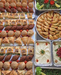 many different types of food on display in trays