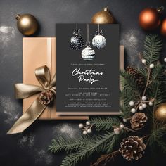 an elegant christmas party with presents and ornaments on the table, surrounded by pine cones