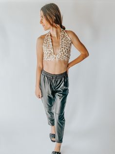 This cheetah crop top is perfect for a summer day. It is lightweight, and is made of soft material. Adjustable straps that tie around the neck. 60% Poly 32% Rayon 8% Spandex Chic Triangle Top Crop Top For Day Out, Chic Triangle Crop Top For Day Out, Stretch Triangle Crop Top For Day Out, Stretch Triangle Halter Top For Day Out, Stretch Halter Top With Triangle Shape For Day Out, Chic Stretch Crop Top, Bra Friendly, Stretch Athleisure Crop Top For Night Out, Stretch Triangle Crop Top For Workout, Chic Triangle Stretch Crop Top