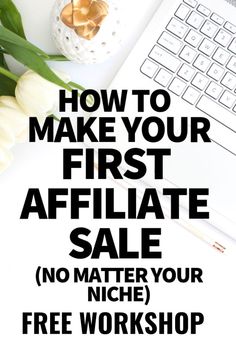 a white desk with flowers and a laptop on it that says how to make your first affiliate sale no matter niche