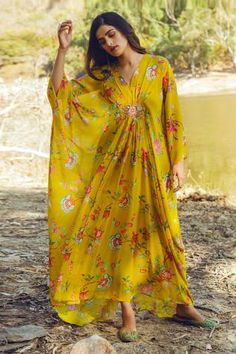 Yellow kaftan with all-over floral print, V-neckline and embellished at the waist. Comes with cotton silk inner slip.
Component: 2
Printed, Embellished
Neckline: V-Neck
Sleeve Length: Three Quarter
Fabric: Georgette
Color: Yellow
Embellishments at the waist - Aza Fashions Kaftan Outfit, Paulmi And Harsh, Kaftan Design, Kaftan Women, Kaftan For Women, Printed Kaftan, Kaftan Designs, Silk Kaftan, Indian Fashion Designers