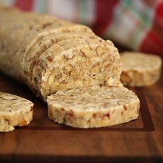 some kind of bread that is on a cutting board