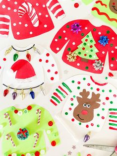 paper plates decorated with christmas sweaters and decorations