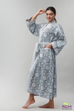 "Immerse yourself in a breathable 100% cotton fabric Kimono - a symbol of longevity and good fortune. Kimono , a loose fitting garment slips over your shoulders and tied at the waist with a flexible belt making a new dressing style. It has two pockets in front to help you keep your mobile and keys. It can be perfect for all weather, stylish, versatile outfit from casual to refined. A lightweight flowy outfit comes in a wide variety of options - cropped, mid-length to full length. Depending on yo Blue Cotton Sleepwear For Home, Light Blue Cotton Sleepwear For Home, Light Blue Cotton Sleepwear, Blue Cotton Robe For Relaxation, White Cotton Nightgown Relaxed Fit, Cotton Spring Robe For Bedtime, Blue Cotton Nightgown For Spring, White Cotton Relaxed Fit Nightgown, Spring Cotton Robe For Bedtime