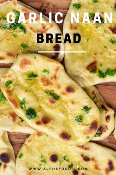 garlic naan bread on a cutting board with text overlay that reads garlic naan bread