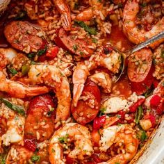 a large pot filled with cooked shrimp and vegetables